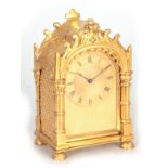 VINER, LONDON A SMALL REGENCY ORMOLU MANTLE TIMEPIECE the rococo style case enclosing a 2.5"