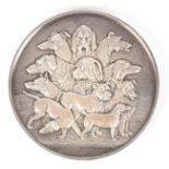 A LARGE CASED SOLID SILVER MEDALLION by A. Fenwick having relief decoration depicting various