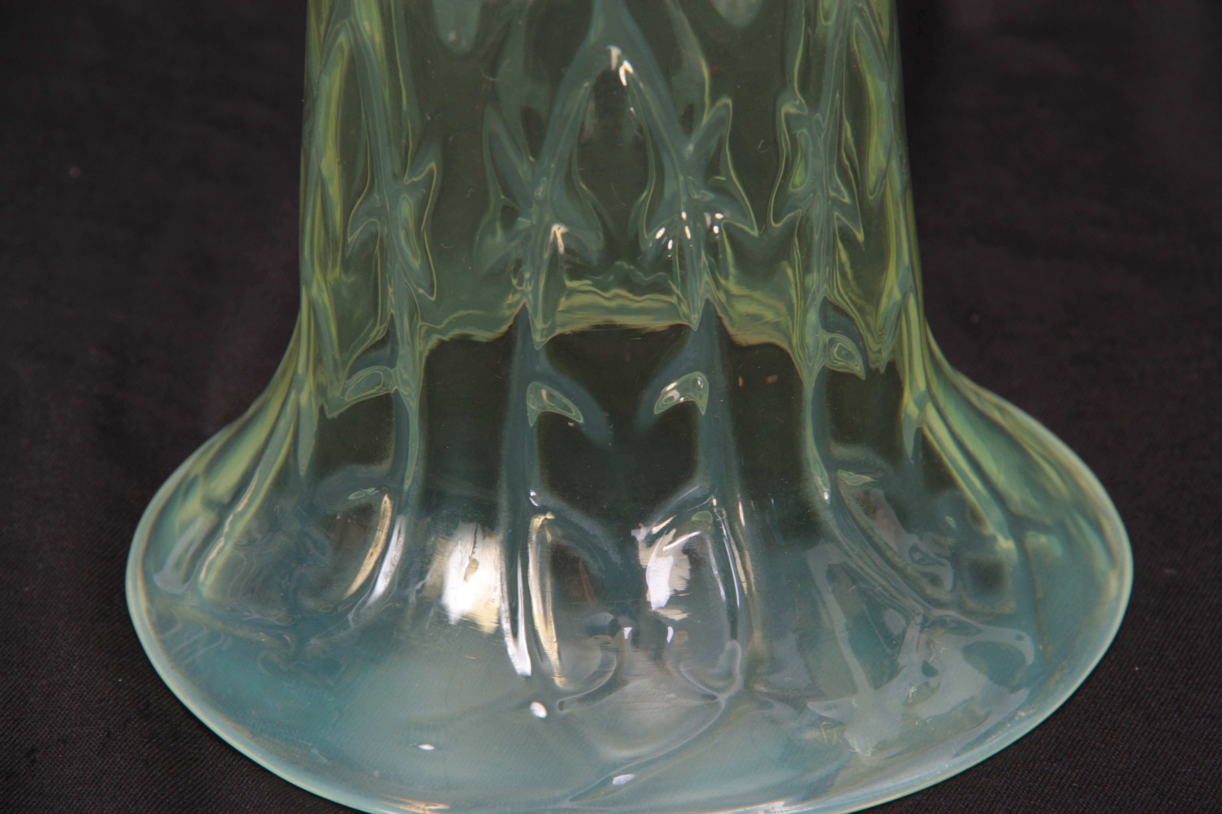 A 20TH CENTURY VASELINE GLASS HANGING SHADE of skirted form with relief moulded pronged leafwork - Image 2 of 2