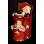 A 19TH CENTURY STAFFORDSHIRE FIGURE GROUP depicting the Vicar and Moses, the sleeping clergy in a