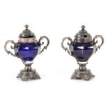 A PAIR OF LATE 19TH CENTURY SILVER MOUNTED BRISTOL BLUE GLASS MUSTARD POTS with faceted gilt lined