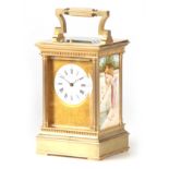 A LATE 19TH CENTURY AESTHETIC PERIOD FRENCH PORCELAIN PANELLED REPEATING CARRIAGE CLOCK the brass