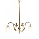 AN ART NOUVEAU BRASS TWO BRANCH LIGHT FITTING formerly fitted for gas, having stylised mounts and