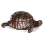 A FRANZ BERGMAN STYLE PATINATED BRONZE INKWELL modelled as a tortoise, the hinged shell opening to