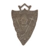 A RARE EARLY PERIOD SOLID SILVER PATINATED BADGE of shield shape depicting a knight in chain mail