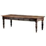 A LARGE 19TH CENTURY PINE COUNTRY HOUSE KITCHEN TABLE with overhanging top above a turned leg base