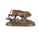 AFTER P.J. MENE. A LATE 19TH CENTURY FRENCH PATINATED BRONZE SCULPTURE modelled as a dog on the