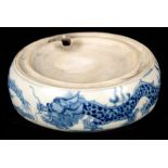 A CHINESE QIANLONG BLUE AND WHITE PORCELAIN INK STONE with five claw dragon decoration, the