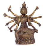 AN 18TH/19TH CENTURY TIBETAN FIGURAL BRONZE modelled as Chakrasamvara, the four-headed Buddhist