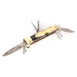 A 19TH CENTURY HORN HANDLED MULTIBLADE SHOOTING KNIFE with brass mounted cartridge puller for 12 and