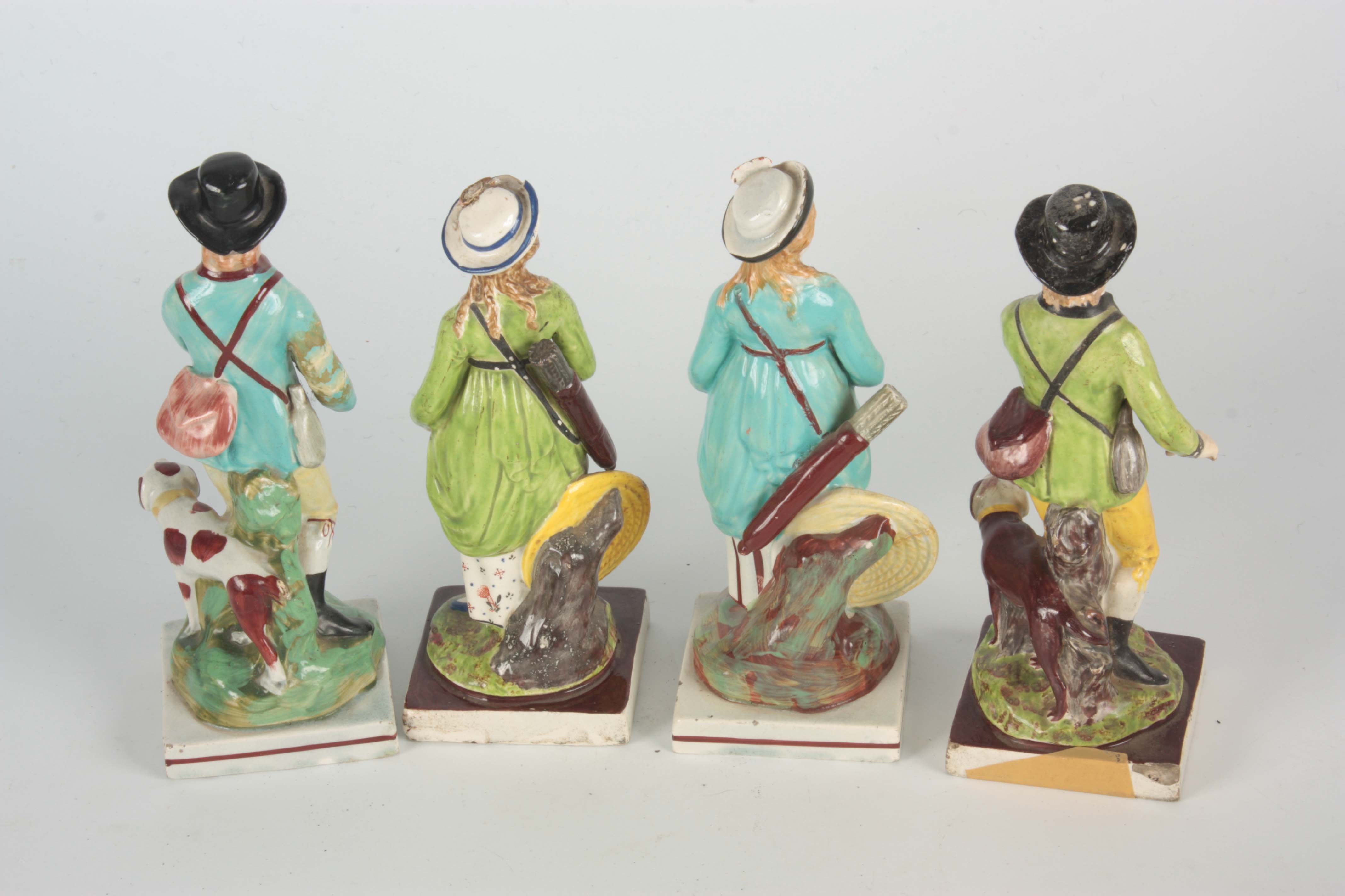 A PAIR OF 19TH CENTURY STAFFORDSHIRE STANDING FIGURES titled 'SPORTSMAN' and 'ARCHER' 18cm high - Image 4 of 4