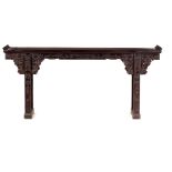 A FINE QUALITY 18TH CENTURY STYLE CHINESE VERY HEAVY HARDWOOD ALTAR TABLE with scrolled ends, the