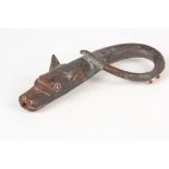 AN EARLY IRON MOUNT POSSIBLY PICT PERIOD depicting a horses head 11cm wide.