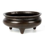 AN EARLY CHINESE BRONZE CENSER WITH MING FOUR CHARACTER MARK TO THE UNDERSIDE of squat baluster form