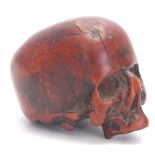 AN EARLY 18TH CENTURY CARVED BOXWOOD EUROPEAN SCULPTURE formed as a Human Skull 5cm wide.