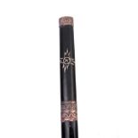 AN ORIENTAL BLACK LACQUER AND INLAID SAMURAI SWORD with cast Copper dragon work collars and bindings