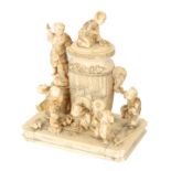 A LARGE 19TH CENTURY CARVED IVORY JAPANESE OKIMONO depicting young children playing on a large