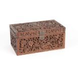 AN 18TH CENTURY CHINESE CARVED HARDWOOD JEWELLERY BOX with leafwork and floral decoration, having