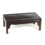 A 19TH CENTURY CHINESE HARDWOOD ALTAR TABLE (POSSIBLY ZITAN WOOD) with panelled top above shaped leg