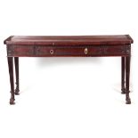 A LATE 19TH CENTURY MAHOGANY SERVING TABLE with blind fret carved edges and rosette carved