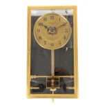 A 1930's FRENCH BULLE ELECTRIC WALL CLOCK the brass moulded frame inset with five bevelled glass