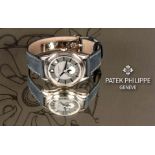 A GENTLEMANS 18CT WHITE GOLD PATEK PHILIPPE COMPLICATIONS ANNUAL CALENDAR WRISTWATCH 5205G-001