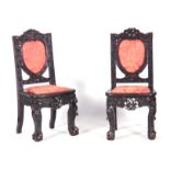 A PAIR OF 19TH CENTURY CHINESE CARVED HARDWOOD SIDE CHAIRS constructed from extremely heavy dense