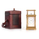 A MINIATURE SWISS PUSH BUTTON MINUTE REPEATING CARRIAGE CLOCK CIRCA 1900 the brass case with