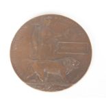 A WORLD WAR I CAST BRONZE COMMEMORATIVE PLAQUE relating to RICHARD KEEFE 12cm diameter