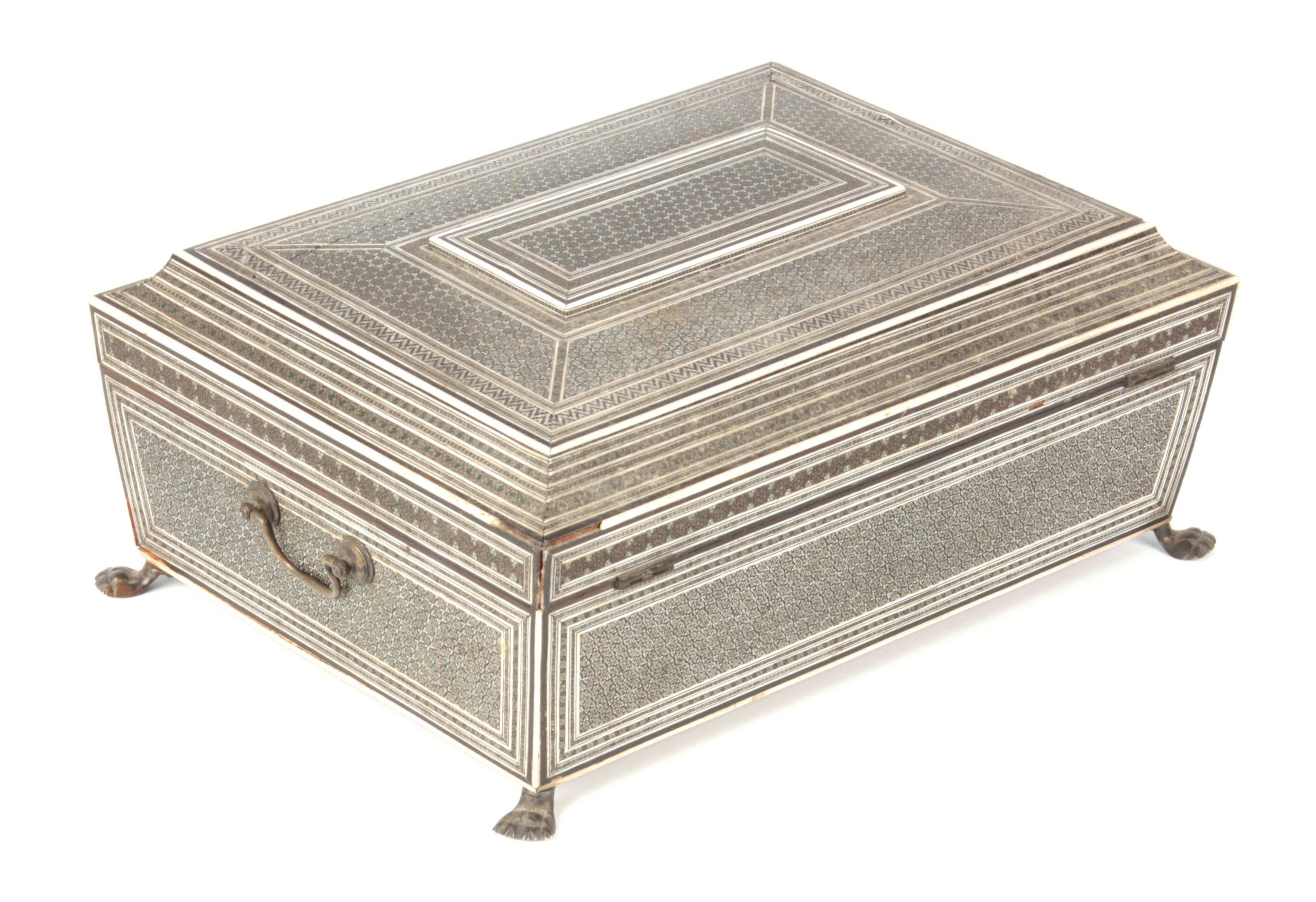 A REGENCY ANGLO-INDIAN SADELI BOMBAY PRESIDENCY WORKBOX of sarcophagus form with ivory and ebony