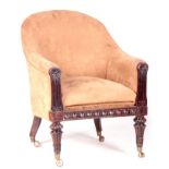 A GEORGE IV ROSEWOOD UPHOLSTERED GILLOWS STYLE LIBRARY CHAIR with shaped back and tapering fluted