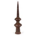 AN 18TH CENTURY IRON INDIAN PIKE HEAD of cylindrical form 27cm overall