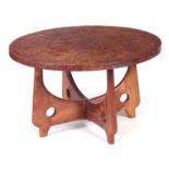 A 20TH CENTURY TEAK CIRCULAR OCCASIONAL TABLE BY ANGEL PAZMINO ECUADOR (CIRCA 1970) having an