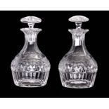A PAIR OF GEORGE III DESIGN CUT GLASS DECANTERS AND STOPPERS with blade and diamond banded mallet