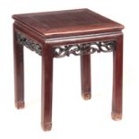 A 19TH CENTURY CHINESE HARDWOOD JARDINIERE STAND with square panelled top and carved pierced frieze;