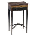 AN EARLY 19TH CENTURY PAINTED BLACK LACQUER SEWING TABLE the two-part foldout top enclosing a lidded