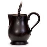 A LARGE LATE GEORGE III PATINATED COPPER ALE JUG of baluster form with hinged loop handle and