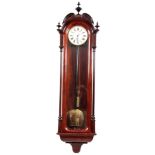 A GIANT-SIZE FIGURED WALNUT 8-DAY VIENNA REGULATOR WALL CLOCK the enamel dial with Roman numerals