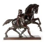 A LARGE 19TH CENTURY FRENCH PATINATED BRONZE SCULPTURE modelled as an Amazon beside a rearing