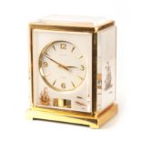 A 1970's JAEGER LE COULTRE MARINA SHIPS MODEL SWISS ATMOS CLOCK classic model gilt brass and white