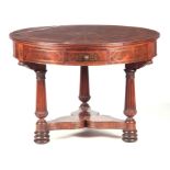A FINE REGENCY BRASS INLAID MAHOGANY AND ROSEWOOD DRUM TABLE IN THE MANNER OF JOHN McCLEAN with