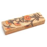 AN ORIENTAL SLENDER RECTANGULAR LIGHT BROWN SOAPSTONE BOX with carved coloured flower spray