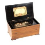 A 19TH CENTURY SWISS 12 AIRS INLAID ORCHESTRAL MUSIC BOX the box with marquetry panel to the lid