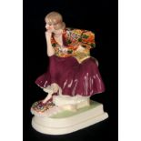 A GOLDSCHIEDER HAND DECORATED SEATED FIGURE OF A LADY 22.5cm high printed mark and impressed Nos