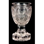 A 19TH CENTURY EUROPEAN GLASS GOBLET with petal-shaped star cut base on a hexagonal stem and