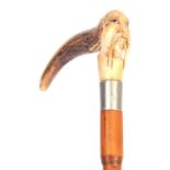 A 19TH CENTURY CHINESE MALACCA AND CARVED HORN WALKING STICK with figural stag horn carved handle