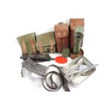 Box of military items including helmet, gun slings, mess tins, puttees, pouches etc