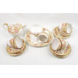 Minton Ardmore pattern part tea set and a Aynsley Rose decorated Tea Set. Condition - Break to