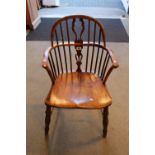 19thC Elm stick back Elbow chair with shaped seat and turned supports