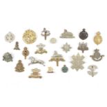 Collection of British Army cap badges, various regiments, some enamelled versions